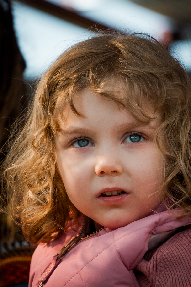 Candid environmental portrait of a young girl.